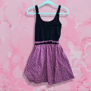 This PINK dress, is a small but it’s very stretchy so it can fit other sizes.